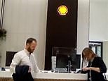 Extinction Rebellion activists glue their hands to reception at Shell London HQ