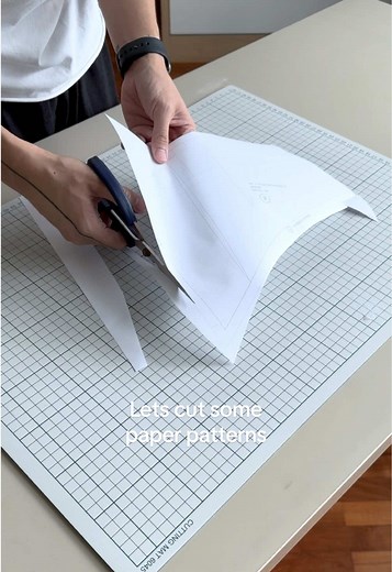 A tedious yet essential part of the process. #fashiontiktok #fashiondesigner #designer #patternmaking #design #sewing