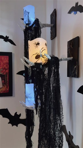 Spooky corner in my teen’s room 👻 The DIY skeleton hand candle holders on the wall were inspired by @stephaniehannahome. Head over to her page for a full tutorial 🖤 #dollartree #halloweendiy #spookyseason #dollartreediy