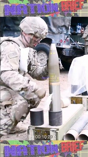 U.S. Airborne paratroopers firing a M119 105mm Howitzer