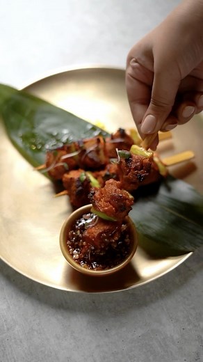 The Burmese love to grill their food for a smoky and charred flavour. That’s why at Burma Burma we present you a Mock Meat Skewer, as an ode to a process that’s so commonly used. Modernised for your plate, this skewer will give you the flavours of a host of spices, lemon zest, and tamarind; and is served with a sweet-chilli sauce. A bite of this is evocative of the streets of Burma where you will commonly find hawker stalls handing out skewers fresh off the grill. #BurmaBurma #BurmaBurmaIndia [m