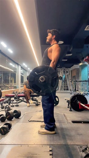 Back workout at gym death lifts.