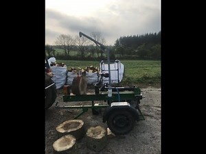 log lift for my log splitter. Homemade with a winch.