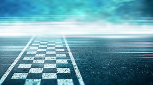 Abstract Race track finish line racing on light night