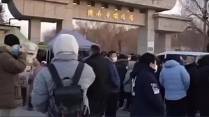 Video shows angry crowds at China funeral parlor
