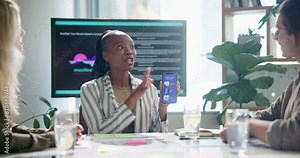 Business people, meeting and phone with screen for app, software development or innovation at office. Group of employees in team discussion for UI, interaction or engagement on mobile smartphone