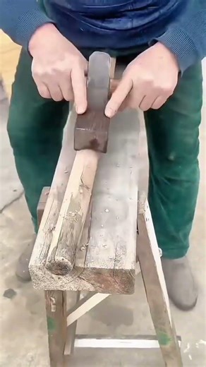 Traditional Woodworking Shaping a Round Wooden Pole