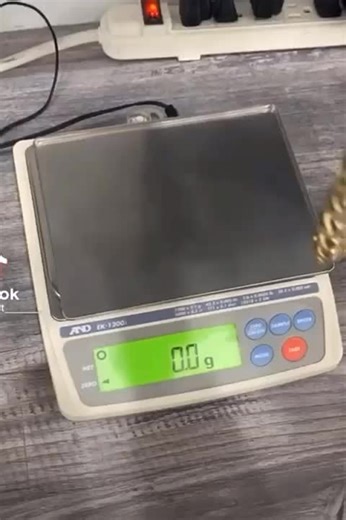 Measuring a Glamorous Gold Bracelet on a Scale