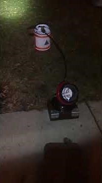 Little Buddy heater attached to 5 lb Growler Propane Tank at night