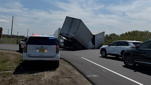 Semi-truck tips over on SR-710, prompting traffic reroutes and safety calls