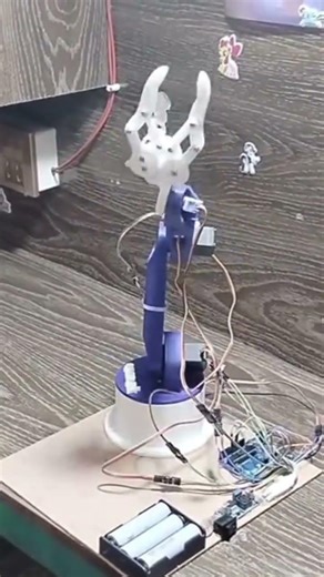 robotic arm #automobile #experiment # by using serwos #charginglightkaisebanaye #arduino uno used #a