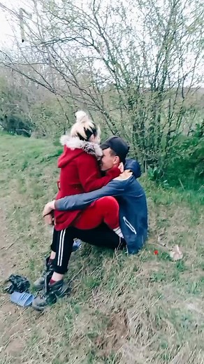 Comforting Moments in Nature: A Couple's Embrace