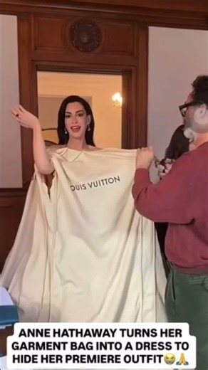ANNE HATHAWAY TURNS HER GARMENT BAG INTO A DRESS TO HIDE HER PREMIERE OUTFIT #annehathaway