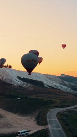 Drone Footage of Hot Air Balloons' Colorful Serenity.
