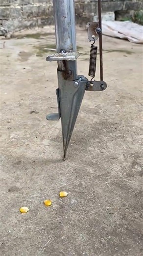 the process of testing a seed spreading tool to make the work of farmers easier