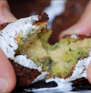 This is probably the dumbest thing in theory, but it's AMAZING when you eat it. Especially hit it with that white sauce (https://youtu.be/aYEtBcxmj7c?t=6m56s), I promise you the creamy filled hummus falafel changes the game. NO more DRIED FALAFEL ever again! Learn more about creative ways to use hummus here: https://youtu.be/6GwprhyLVfM | Brothers Green