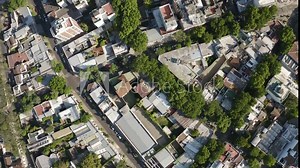 Birds eye view of San Isidro, Buenos Aires, Argentina with cityscape, buildings, and neighborhoods - 4K Drone