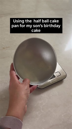 I used a half ball cake pan that I bought years ago for my oldest’s birthday cake. I should have added cake pans under the pans to keep them from wobbling when I put the tray in the oven but I wasn’t sure how it would affect the heating process. So I left them alone. Did you try the round cake pan trick?? Check out my previous video on how to make this cake! #cakedecorating #baking