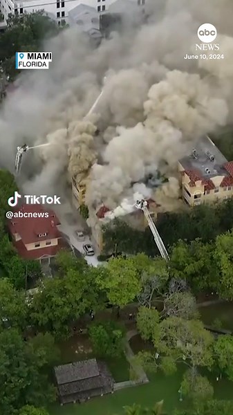 DEVELOPING: Firefighters are battling a large fire at a Miami residential building where a person was found shot inside, authorities said. Responding firefighters rescued several people, including some from their balconies, the mayor said, calling their actions