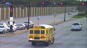 Caught on camera: School buses running red lights