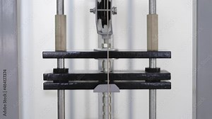 Weight falling in block machine and cloud of powder raising in gym in slo-mo. Load the iron pancakes sports trainer