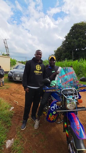 Heri Tuchizi with Mbae's New Bike