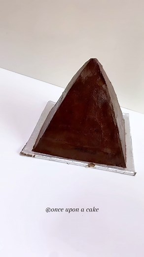 6.5K views · 50 reactions | Here’s how we finished the Carved Pyramid Cake ✨ #pyramid #pyramidcake #pyramids #egyptian #camelcake #cakedecorating #cakevideo #cakeart #cakestagram #cakestyle | Once Upon A Cake | Facebook