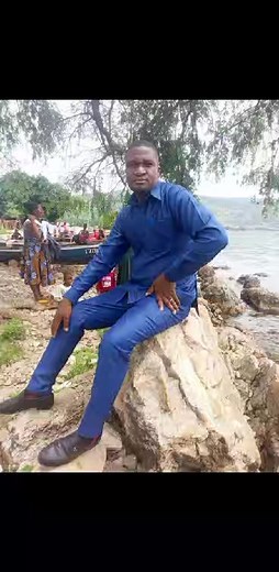 Learning how to play a guitor. | Michael John