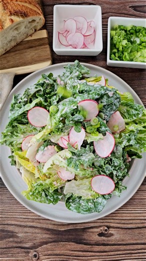 Curly Green Salad with Marinated Radishes from the Test Kitchen! Fresh, bright, and full of flavor. Recipe here: https://womenoftoday.com/curly-green-salad-with-marinated-radishes/ | Women of Today By Camila Alves McConaughey