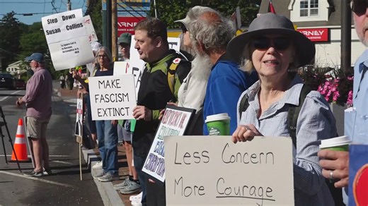 A crowd of protesters picketed at an event marking the end of a roadwork project on Route 1 in Searsport that Sen. Susan Collins, R-Maine, was scheduled to attend. | NEWS CENTER Maine