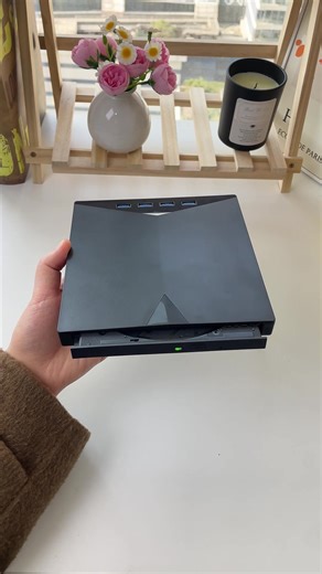 Unlock Your Old CDs and DVDs with This 7-in-1 External Drive