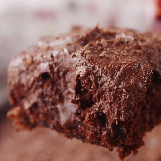 WARNING: Death By Chocolate Poke Cake will result in a serious food coma. Full recipe: http://dlsh.it/y8g2xSZ | Delish