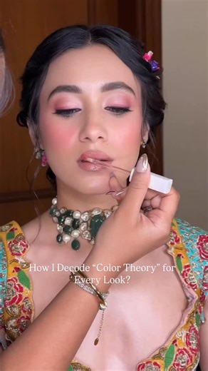 Kareena Sisodiya | Makeup Artist on Instagram: "Color Theory 101 ✨ Ever wonder how I choose the perfect shades? It’s all about the Color Wheel. For this look, the jewelry and outfit told the story: • The Jewelry: Since Emerald Green is the star, I chose Dusty Rose tones. Pink and Green are complementary they make each other “pop” without clashing. • The Outfit: To balance the bright yellows and reds, I kept the face monochromatic. Using the same rose family on eyes, cheeks, and lips creates a se