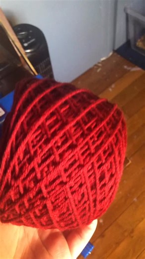 Shia on Instagram: "Grab the Melt the ICE hat over on Ravelry! All proceeds go to helping the community in Minneapolis. “In the 1940’s, Norwegians made and wore red pointed hats with a tassel as a form of visual �protest against Nazi occupation of their country.� Within two years, the Nazis made these protest hats illegal and punishable by law to wear, make, or distribute.”"