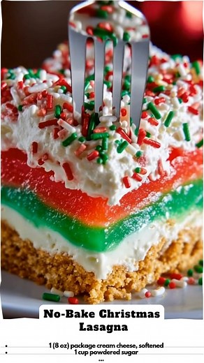 No-Bake Christmas Lasagna is the ultimate festive dessert! With its colorful layers of Jell-O, creamy cheesecake filling, and a crunchy graham cracker crust, this easy make-ahead treat is a guaranteed showstopper for any holiday gathering. #ChristmasLasagna #NoBakeDessert #HolidayDessert #JelloDessert #LayeredDessert #ChristmasRecipes #FestiveFood #EasyDessert #NoBake #ChristmasTreats #HolidayBaking #DessertLasagna | Recipes all time