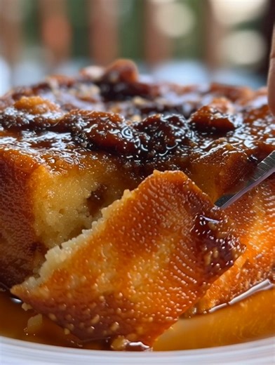 Puerto Rican-Style Bread Pudding (Budín de Pan) Ingredients: 1 loaf of day-old bread (about 10 slices) 4 large eggs 1 can (12 oz) evaporated milk 1 can (14 oz) sweetened condensed milk 1 cup whole milk ½ cup brown sugar 1 tablespoon vanilla extract 1 teaspoon ground cinnamon ½ cup raisins Butter, for greasing the baking dish Instructions: 1. Preheat the oven and prepare the dish: Preheat your oven to 350°F. Grease a baking dish with butter. 2. Prepare the bread: Cut the bread into cubes and spre