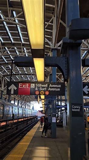 Old orange Q train sign at coney island