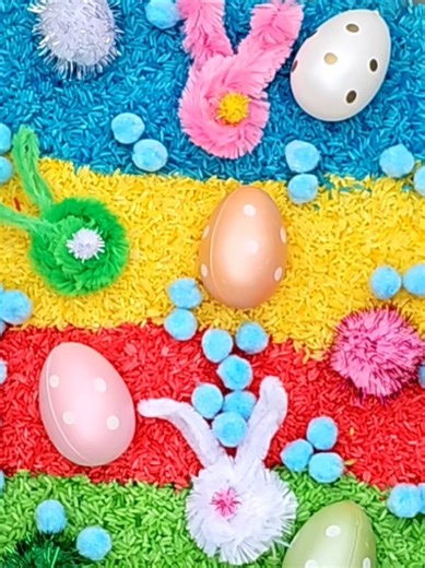 Little hands love to explore, scoop, and discover 🐰🌈 This Easter sensory bin is simple to set up and full of playful learning. We used coloured rice, pom poms, plastic eggs, and bunny pipe cleaners to create a bright and inviting sensory experience. 🥚✨ Watch little hands explore as they scoop, sort, hide, and find treasures in the rice. Activities like this support fine motor skills, creativity, and independent play while keeping little minds engaged. Sensory bins don’t need to be complicated