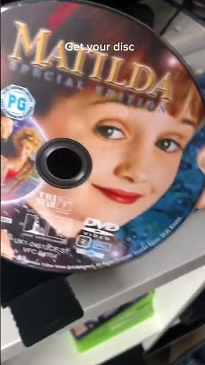 How to put a disc in ps2