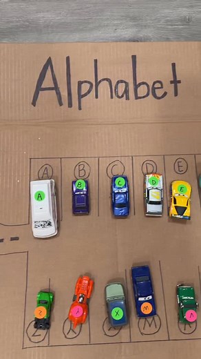 4.7K views · 31K reactions | Made my toddler an alphabet parking lot on cardboard and it was an instant hit for the car fanatics in my house. Such a simple way to sneak in letter matching and keep them busy.  ‍ Follow me for more toddler activity ideas. #toddleractivity #toddlerhacks #momlifetips #learningthroughplay #busymomsbelike | LeahVidaurre | Facebook