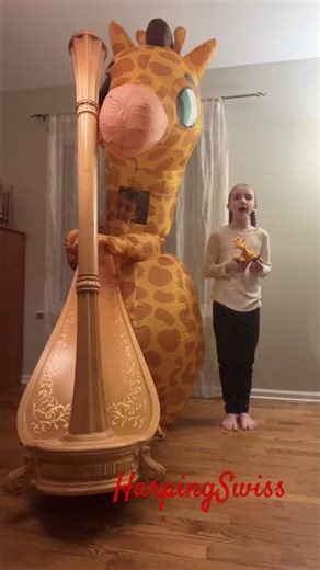 Blow-up Giraffe on Harp😁