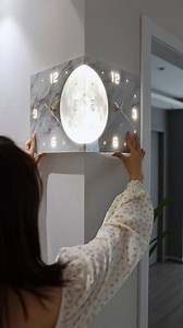48K views · 44 reactions | ️ Time to upgrade my clock game with this new Moon Shape LED Wall Clock!  Not only is it silent and double-sided, but it also comes with 3 light colors to match any mood. 朗 And let's not forget the remote control for ultimate laziness.  Who says telling time can't be fun and stylish? ‍♀️ #LEDclockgoals #moonshape #silentsounds #decorativetimepiece | Smart Finds | Facebook