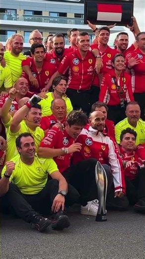 Charles Leclerc celebrates victory with Lewis Hamilton in Silverstone