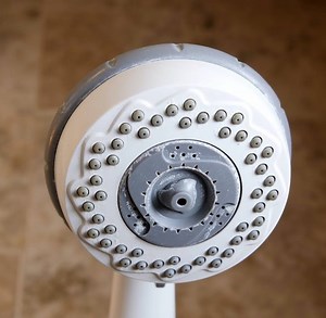 265K views · 60 reactions | If your showerhead has low water pressure or just looks gross and needs a good cleaning, here are some simple tips on how to clean it with stuff you might find around the house. | CNET | Facebook