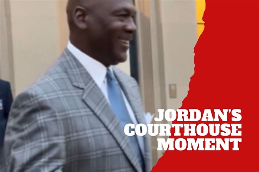 Michael Jordan laughs after fan plays Be Like Mike outside courthouse