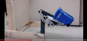 Six-bar Trash Dumping Linkage