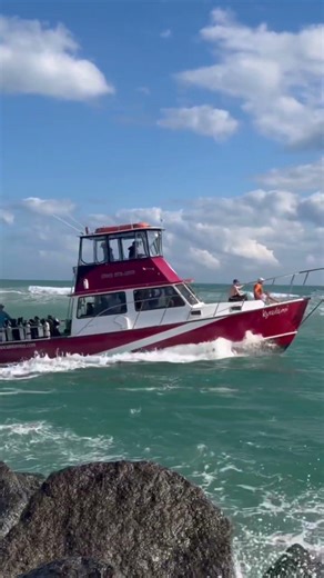 Boat leaving Jupiter Inlet, Florida