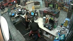 "Get on him, baby," an armed robber yells to his female accomplice during a terrifying crime caught on video at a Compton gas station. As the clerk tries frantically to open the register, the armed man tells him, "Hurry up before I shoot you!" Read KTLA's story here: http://on.ktla.com/a0vCu | KTLA 5 News