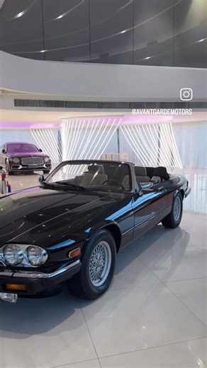 1986 Jaguar XJS V12 Cabriolet Produced from 1975 to 1996, the Jaguar XJS V12 (initially XJ-S) was a luxurious grand tourer that succeeded the E-Type, designed with a 5.3L V12 engine and aerodynamic styling by Malcolm Sayer. Despite slow early sales due to the 1970s oil crisis, it matured over a 21-year run into a respected luxury car, gaining a "High Efficiency" (HE) engine in 1981, a convertible version in 1986, and a significant 1991 facelift, with production ending in 1996. | Cars & Motorbike