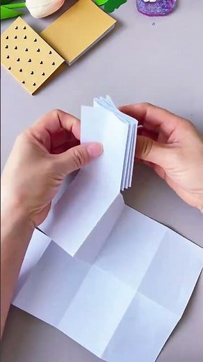 Make a small book with A4 paper. Fold a stack of A4 paper and cut three times. Go and teach your